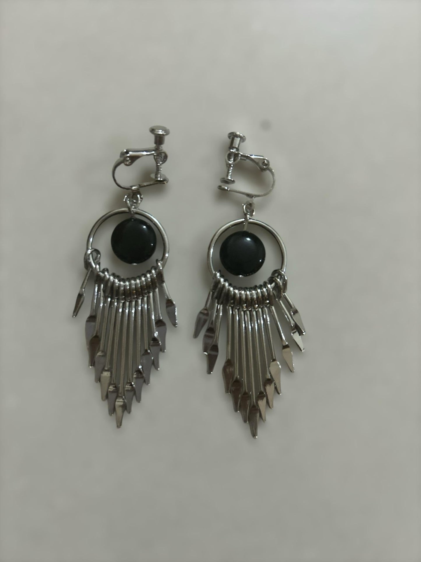 Silver Winged Fan Drop Earrings with Black Stone.
