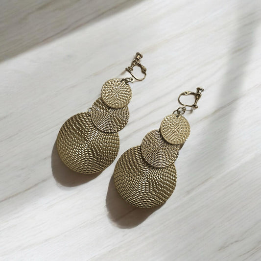 Geometric Gold Spiral Disc Drop Earrings.